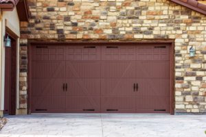 Wide Garage Doors. Brick Wall Garage. Residential Architecture.